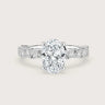 Lab-grown oval diamond engagement ring. 18k white gold band with diamond accents. "R24830OVA" style.