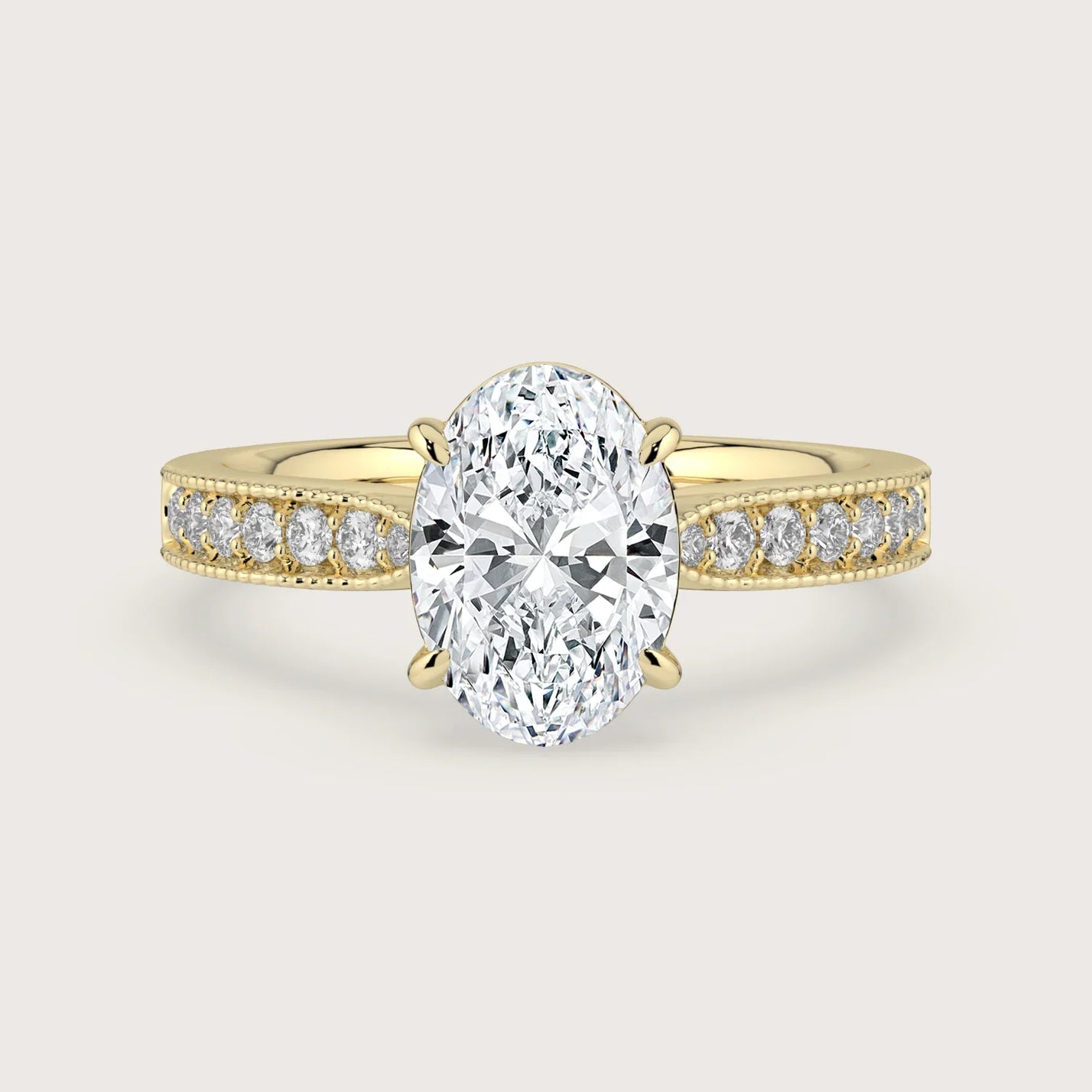 Oval lab-grown diamond engagement ring. 18k yellow gold band with milgrain detail. "R24821OVA" style.