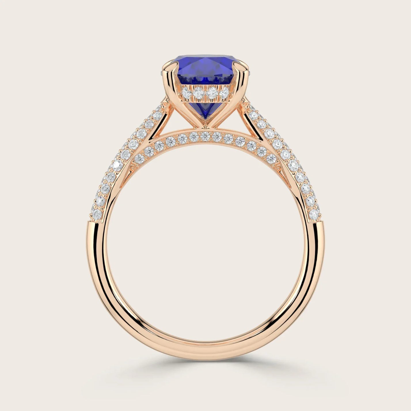 Rose gold ring with oval lab-grown sapphire, hidden halo, and diamond band detail. "R24827OVA.