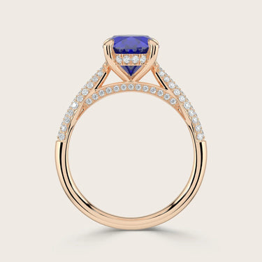 Rose gold ring with oval lab-grown sapphire, hidden halo, and diamond band detail. "R24827OVA.