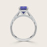 Lab-grown oval sapphire ring with a "hidden halo" and diamond band in 18k white gold.