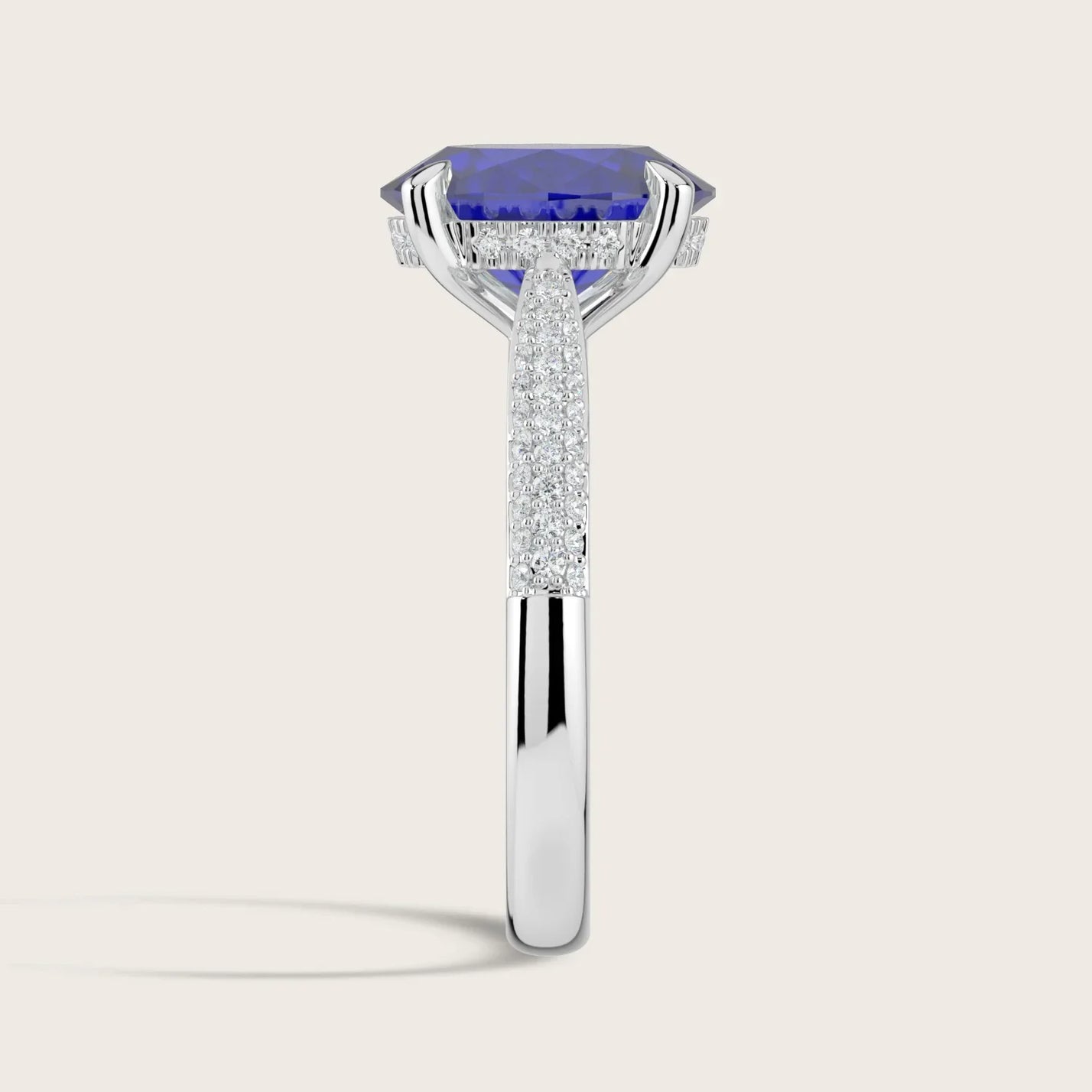 Oval lab-grown sapphire ring, "hidden halo" diamond band in 18k white gold (R24827OVA), side view.