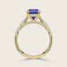18k gold ring with oval lab-grown sapphire, "hidden halo" diamonds, and diamond band detail.