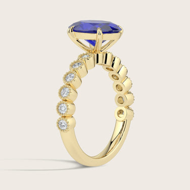 Lab-grown oval sapphire ring, milgrain vintage diamond band in 18k yellow gold, "R24822OVA". Side view.