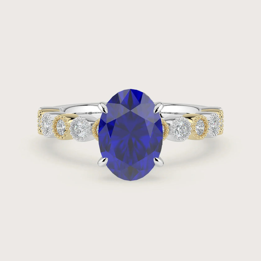 Oval lab-grown sapphire engagement ring in 18k two-tone gold with a milgrain vintage diamond band. "R24822OVA.