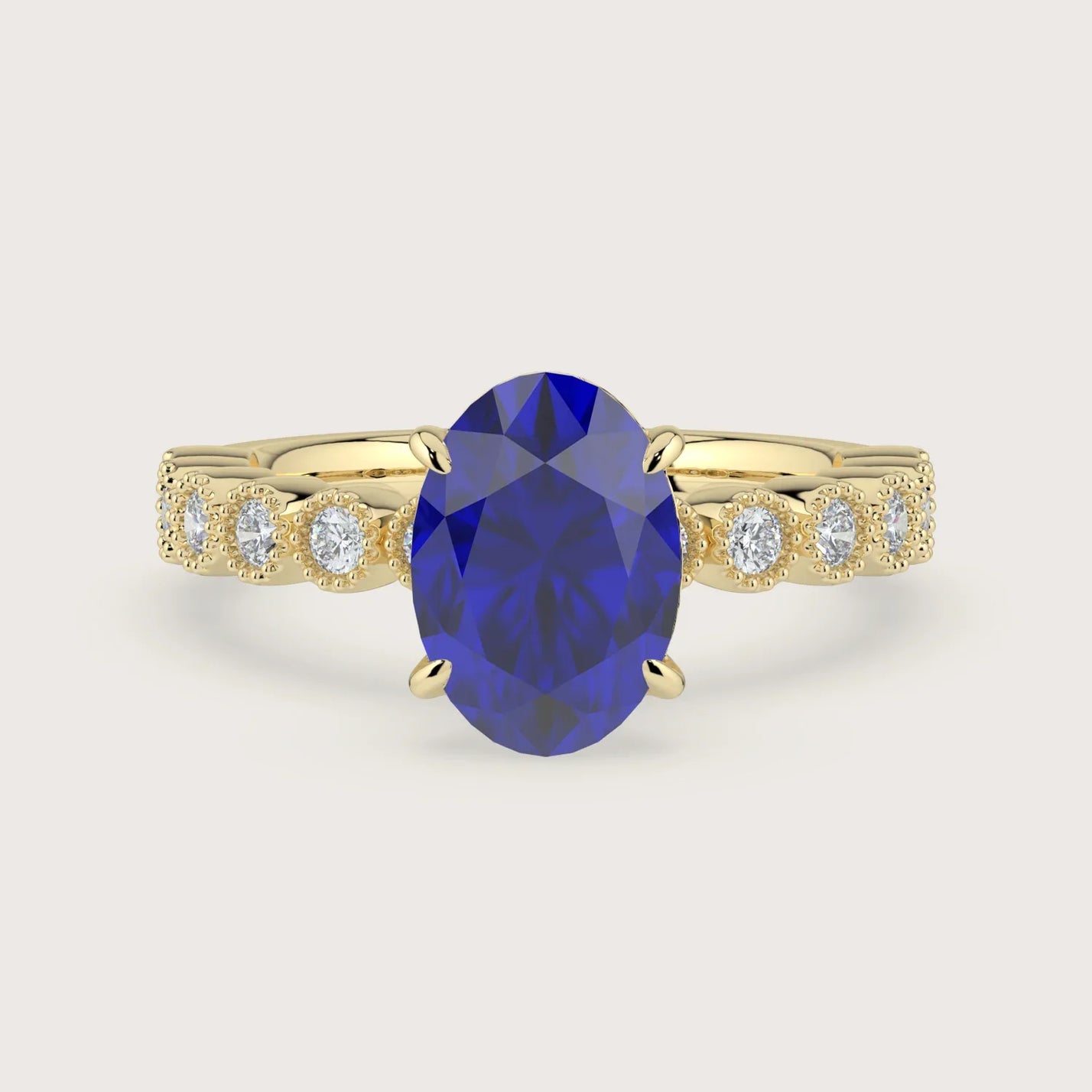 Oval lab-grown sapphire engagement ring. 18k yellow gold, vintage milgrain diamond band detail. "R24822OVA.