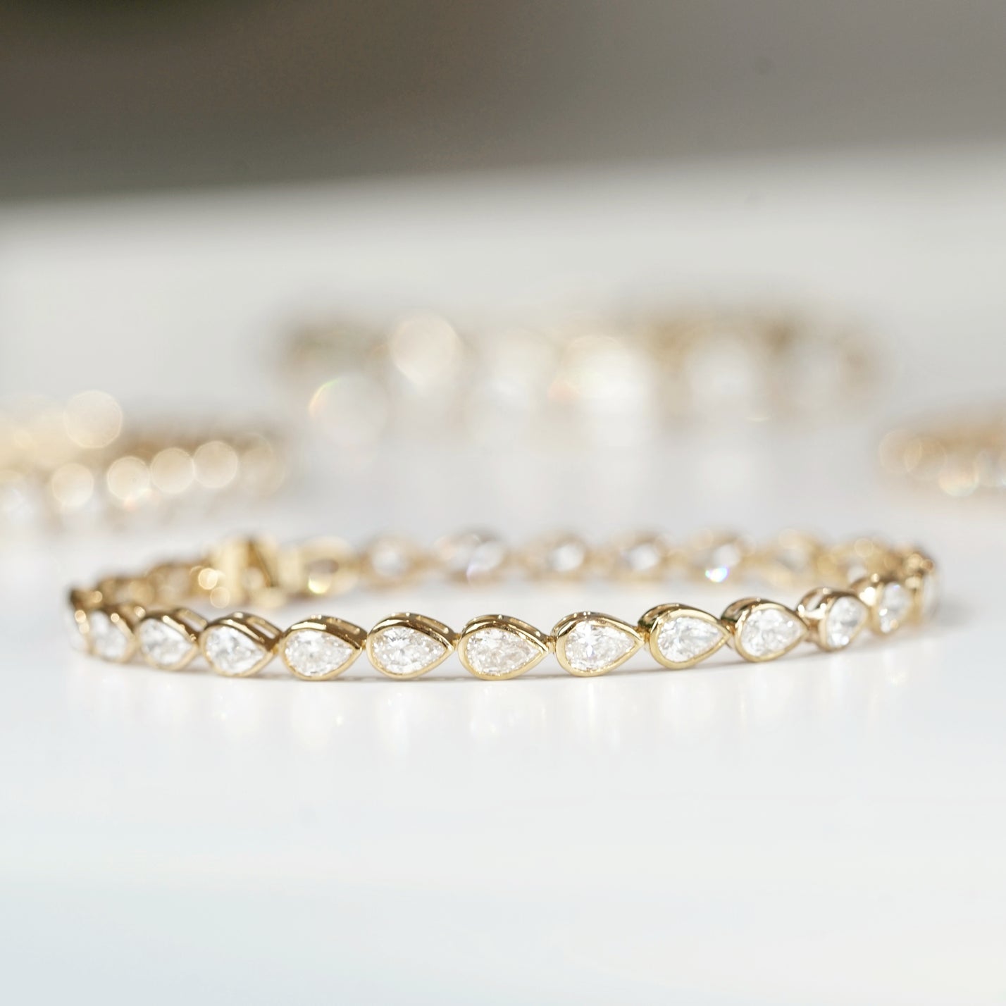 Pear Cut Diamond Bezel Set Tennis Bracelet