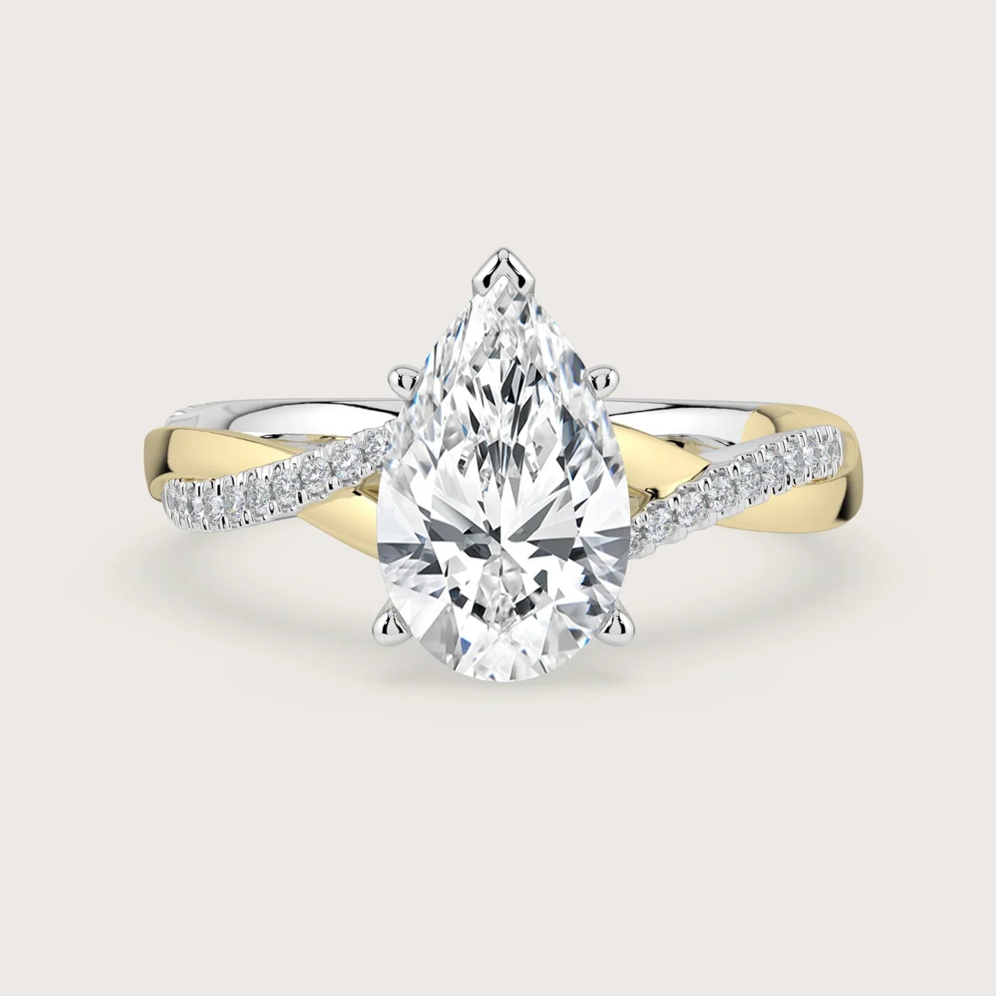 Lab-grown pear diamond engagement ring. 18k two-tone gold twist band with diamonds. "R24823PEA" detail.