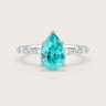Lab-grown pear "Paraiba" gemstone engagement ring. Marquise & round diamond band, 18k white gold.