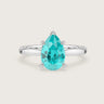 Lab-grown pear "Paraiba" solitaire engagement ring in 18k white gold. Teal gemstone.