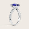 Lab-grown pear sapphire ring. 18k white gold band with diamond accents. "R24830PEA" side view.