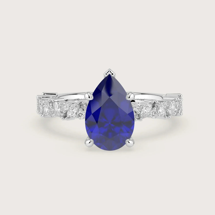 Pear-shaped lab-grown sapphire engagement ring with diamond band in 18k white gold, R24830PEA.