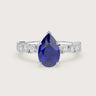 Pear-shaped lab-grown sapphire engagement ring with diamond band in 18k white gold, R24830PEA.