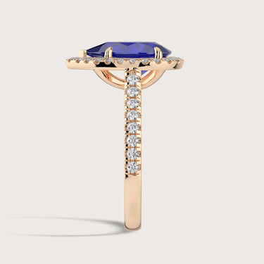 Side view of 18k rose gold ring with pear lab-grown sapphire, diamond halo & band, model "R24818PEHA.