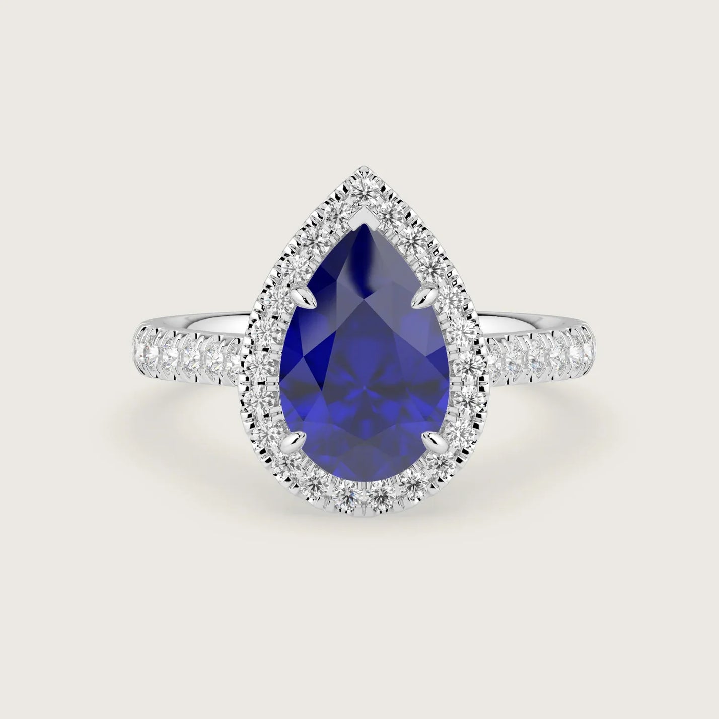 Pear-shaped lab-grown sapphire engagement ring with diamond halo and band in 18k white gold. "R24818PEHA.