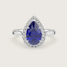 Lab-grown pear sapphire halo engagement ring in 18k white gold. "R24818PEH" design.